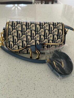 Cream and Blue Monogram Crossbody Saddle Bag with Gold Hardware